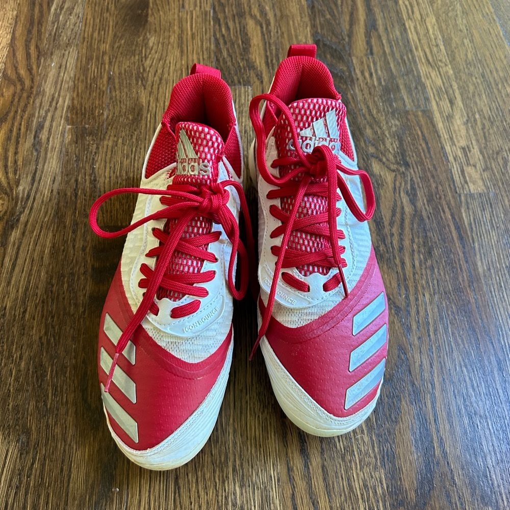Adidas baseball cleats.